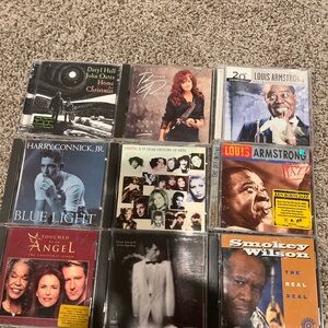 Collection of 9 Music CDs
Includes jazz, blues, and pop.